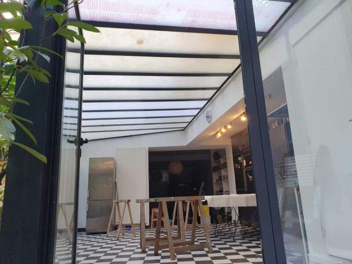 Store banne toiture véranda Les Yvelines