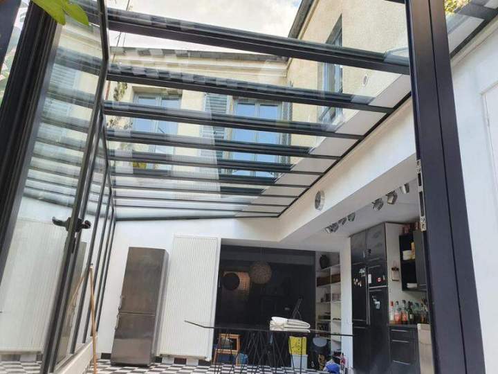 Lavage de toiture extérieure de véranda Les Yvelines